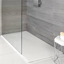 Place wood shims up underneath the shower pan in the corresponding areas for shimmed installations. Milano Rasa White Slate Effect Shower Tray Choice Of Size And Riser Kit