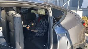 7 seater tesla model y 3rd row hands on! Tesla Model Y How To Get Into The Third Row Of The Seven Seater Configuration
