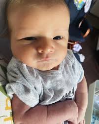 On August 22, Mark and I welcomed Damian Michael Manning into our family.  He's only been here three weeks, but he's made such an impact