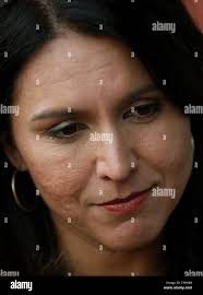 Muscatine, Iowa, USA. 16th Apr, 2019. Democratic presidential candidate  Tulsi Gabbard, the U.S. Representative for Hawaii's 2nd congressional  district listens to a questions from members of the media in Muscatine,  Iowa Tuesday,