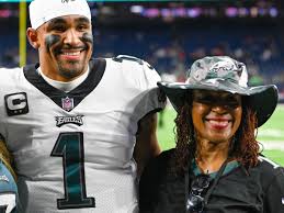 Jalen Hurts' Mom Supports Her Son With Philadelphia Eagles Gear And Victory  Dance | Essence