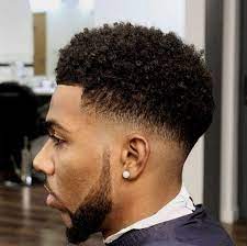 It's a skillful and laborious job but the result is truly impressive. African American Men Hairstyles Taper Fade Haircut Curly Hair Men Fade Haircut