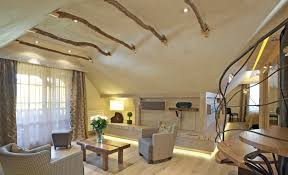 Espace pour les photos, grande chambre double conçue pour les couples et leurs « instants magiques ». Suite De Luxe Avec Terrasse Et Sauna Panoramique En Alsace