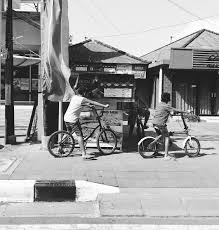 The clip shows the monkey zooming down the street on a miniature motorbike and crashing into a group of children sitting on a bench. Indonesia Bicycles Of The World