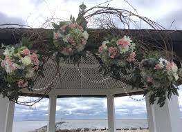 Grapevine Arch With Balls Of Flowers And Flowing Crystals Contact Marion At Bayview Florist Wedding Studio In Sayville Ny Ma Wedding Flowers Wedding Flowers