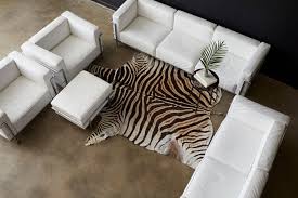A set of steel bars wrapped and provide support for a system of pads. Le Corbusier Lc3 Style White Leather And Chrome Sofa At 1stdibs