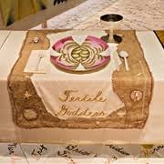 Each setting is laid out on a separate embroidered textile runner. The Dinner Party By Judy Chicago
