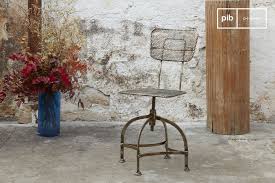 Curry and company tole pineapple chandelier $995.00 set of six woven rattan chairs $995.00 pair of modern peace sign tables $995.00 rattan and seagrass bar cart. Chaise D Atelier En Tole Perforee Style Atelier Pib