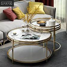 Lower shelf is covered in tightly woven rattan peel. Eden Luxury Round Nesting Coffee Tables Urban Mood