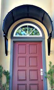 The Black Metal Eyebrow Door Awning In Mountain Brook Al Door Awnings Custom Awnings Awning Over Door