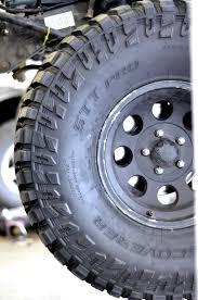 Black And Blue Off Road Wheels 35x12 50r15 Cooper Stt Pro Tires On A Basic Black 15 Inch Wheel Built For The Rocks But Quiet Enough For The Streets Offroad Jeep Shop Jeep