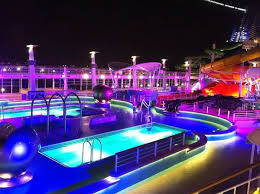 Norwegian Epic Pool At Night Pool At Night Epic Pools Cruise Travel