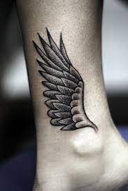 35 Breathtaking Wings Tattoo Designs Cuded Wings Tattoo Ankle Tattoo Designs Tattoos
