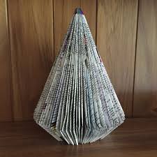 How To Make Trees Or Christmas Trees Out Of Paperback Books Book Art Christmas Book Christmas Tree Christmas Tree Out Of Books