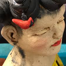 Daydreamer in the Garden Stoneware Sculpture 10"H x 9"W x 7"D