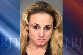 Report says Las Vegas woman hid gun in car before shooting boyfriend
