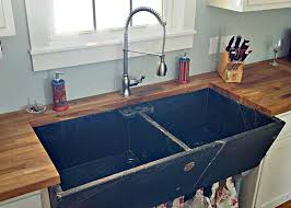 Incorporating the sink, or sinks, into the look and the function of the kitchen is paramount. Soapstone Laundry Sink Reused In Kitchen Laundry Sink Laundry Room Design Laundry Design