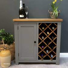 Host the perfect cocktail party by choosing a stylish cabinet from one of our designer brands. New Wine Rack Ideas Wine Rack Storage Oak Wine Rack Wine Rack Table