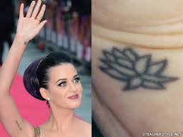 A cherry blossom on her ankle. Katy Perry S Tattoos Meanings Steal Her Style