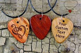 Unique guitar gift for bass, electric & acoustic guitars 4.8 out of 5 stars 2,606 Necklace One Custom Engraved Wooden Guitar Pick Necklace Choose Wood Type And Engraving Custom Guitar Pick 18 20inch Adjustable