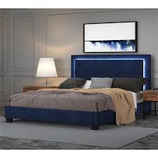 A platform bed with a decorative triple arched head panel, ornate castings and central brass plaque. Nspire Platform Bed With Light Blue King 101 088k Bl Rona