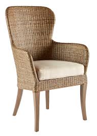 a high back and subtle curves bring an elevated look to this rattan side chair finished with a cream cushion for rattan dining chairs chair occasional chairs
