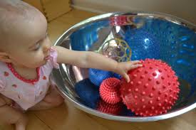 Simple Infant Toys Make Things Happen Infant Activities Toddler Play Infant Classroom