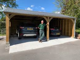 The plenty amount of window and ceiling height gives an incredible sense of space and brightness. Wooden Carports In Devon By Shields Garden Buildings