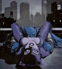 Batman perched on building