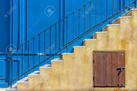 2 mark the level where it meets top of second step. External Stairway Of Vintage Blue Building Staircase Consists Of Metal Handrails Marble Steps Treads And Under Stairs Storage Stock Photo Picture And Royalty Free Image Image 138258983