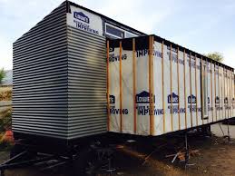 Vertical metal siding can give a building a modern, sleek appearance. Metal Siding On Front Of Trailer Metal Siding Installation Metal Siding Installing Siding
