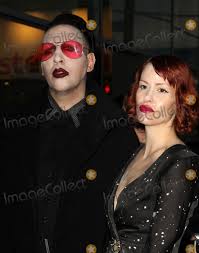Marilyn manson is divorced to lindsay usich. Photos And Pictures 14 March 2013 Hollywood California Marilyn Manson Lindsay Usich Spring Breakers Los Angeles Premiere Held At The Arclight Cinerama Dome Photo Credit Kevan Brooks Admedia