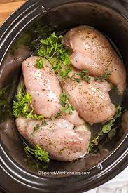 For average size chicken breasts, you should cook them on low for six hours in your slow cooker. Crockpot Shredded Chicken Great Freezer Meal Spend With Pennies