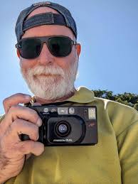 Minolta camera with case and viewfinder for free