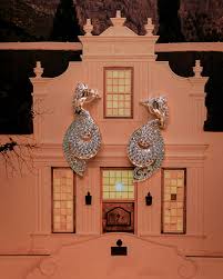 Ibe John eze & Maambo Their paths crossed one rainy afternoon at a cultural  festival celebrating African arts and cuisine. Ibe was setting up his  booth, showcasing his vivid canvases that danced