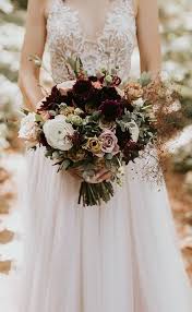 Get inspired by these beautiful fall wedding bouquets for brides getting married in the autumn months. Stunning Fall Wedding Bouquet Inspiration Belle The Magazine Fall Wedding Pictures Fall Wedding Photos Fall Wedding Bouquets