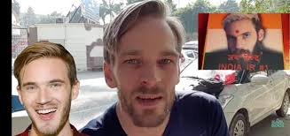 This man is Karl Rock, kinda look like PewDiePie. He went to T-Series HQ to  congratulate them with a cake. He lives in India. Link