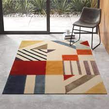 If your home has dark wood flooring, a similarly dark colored rug may be a wise investment. Modern Contemporary Color Block Rug Allmodern