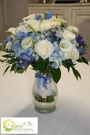 Finished with pearl spray and trailing satin edge organza ribbon. Bridal Bouquet Of Blue Hydrangea White Calla Lilies White Roses And Blue Delphinium Wedding Bouquets Bridal Bouquet Wedding Flowers