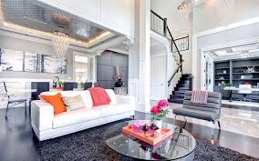 White wood brings warmth to spaces, while white walls keep things bright and cheery. Download Wallpapers Stylish Interior Design Apartments Classical Style Living Room White Walls Crystal Modern Chandeliers White Leather Sofa Two Storey Apartment Dark Brown Wooden Staircase In The Apartment For Desktop Free Pictures For