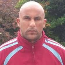 Reinstatement row after footballer denies racist taunts and monkey noises