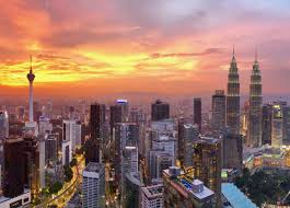 The kuala lumpur guide focuses on top tourist attractions, city. Panoramic Views Of The Kuala Lumpur Skyline At Sunset Velvet Escape