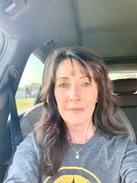 I'm almost 62……loving life!…..I don't really want to change who I am, but I  feel like I should change my hair style as I'm aging? Suggestions are  welcome.