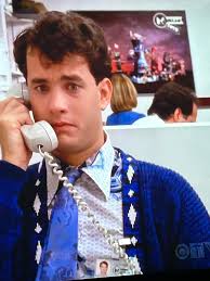 I was watching the movie "Masters of the Universe" from 1987. As a Bad Guy  got thrown into the wall of a Music Store i saw this poster