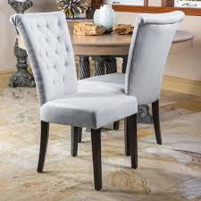 Tasteful styling boasts soft linen upholstery with a button tufted back and nail head trim accents, a curved elm frame, plus shapely legs. Paulina Fabric Dining Chairs Set Of 2 Tufted Dining Chairs Dining Chairs Fabric Dining Chairs