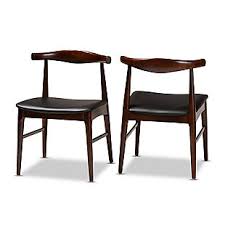 With solid wood legs to offer total support of 250 pounds, these chairs are designed with a modern look and a beautiful combination of colors. Eira Mid Century Modern Black Faux Leather Upholstered Walnut Finished Wood Dining Chair Set Ashley Furniture Homestore
