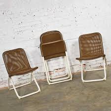 Related searches for samsonite folding chairs: Mid Century Modern Samsonite Round Patio Dining Table And 4 Folding Sling Chairs Warehouse 414