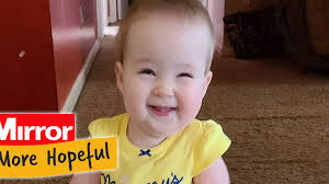 Toddler born with spinal condition defies the odds by learning to walk