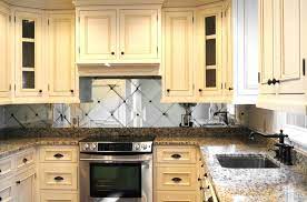 Navy minimalist cabinets plus a black marble backsplash and countertops that spruce up the. Traditional Kitchen With Cream Colored Cabinets And Mirror Backsplash Traditional Kitchen Charleston By Woods Cabinets Llc Houzz