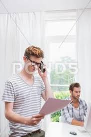 He discovers the secret of his young stepmother and his friends, this will make them more involved with him, his stepmothers and friends. Man Having Phone Call While His Boyfriend Working On Computer Stock Images Page Everypixel